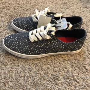 Navy sneakers with white stars, size 7
